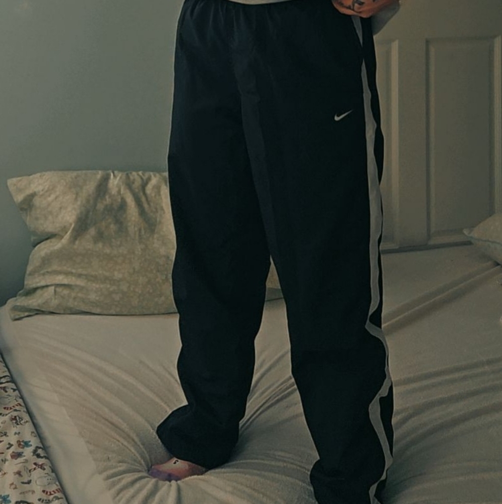 Nike Kids Black Joggers with White Stripe